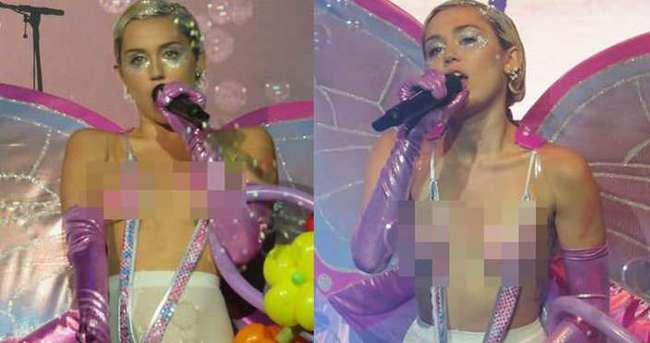 Miley Cyrus partide yarı çıplak eğlendi