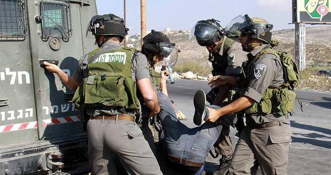 İsrail askerleri 105 Filistinliyi gözaltına aldı