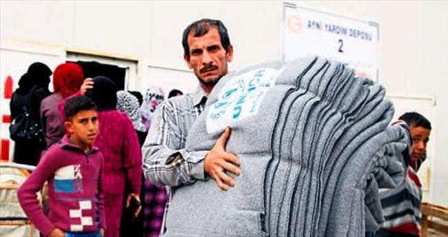 Battaniye yardımı Suriyelileri ısıttı