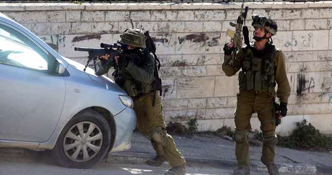 İsrail askerlerinin izin günlerinde ’silah taşıması’ kararı