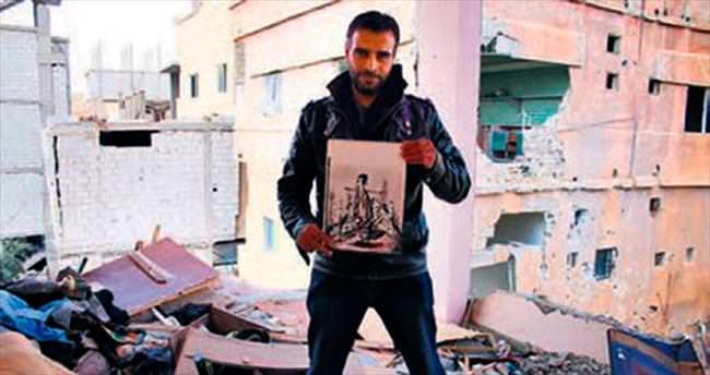 Suriyeli ressam savaşa sanatıyla direniyor