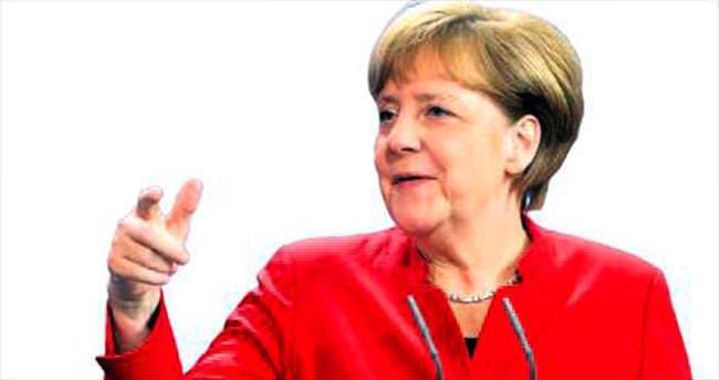 Merkel: Yaptırımların kalkması Minsk’e bağlı