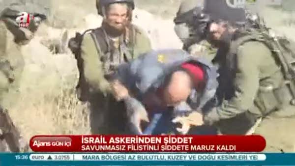 İsrail askerleri Filistinli adamı darp etti