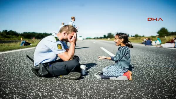 Mülteci kıza kötü davranmayan polis, Avrupa'nın gündemine oturdu