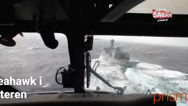 Fırtınada gemi üzerine helikopter indiren pilotun mücadelesi!