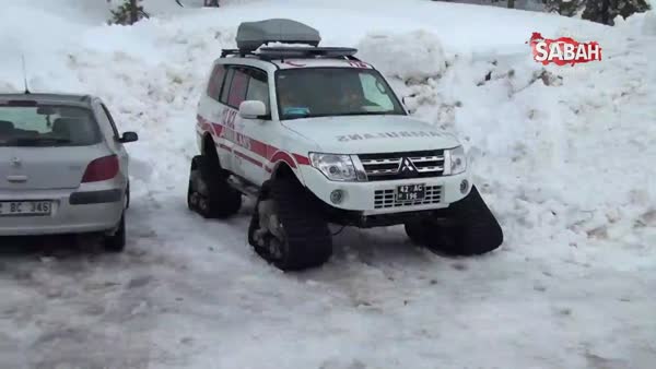 112 görevlisi karda mahsur kalan hastayı metrelerce sırtında böyle taşıdı