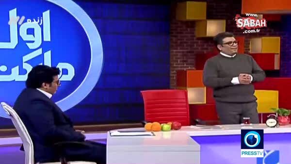 İran devlet televizyonu sunucusu canlı yayında bayıldı