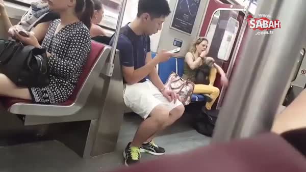 Köpeğine metroda işkence etti!