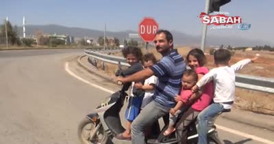 6 kişilik ailenin motosiklet ile tehlikeli yolculuğu kamerada