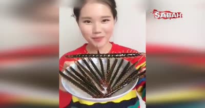 Her çeşit böceği yiyebileceğini iddia eden kızdan şok video!
