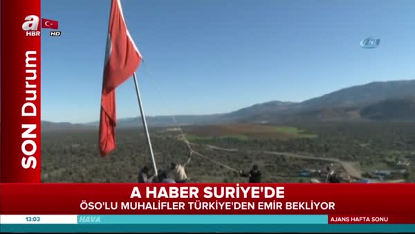 Köylüler Afrin sınırına dev Türk bayrağı astı