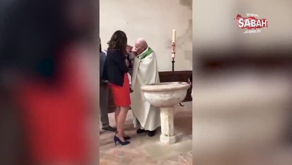 Rahip, vaftiz merasimi sırasında ağlayan bebeği tokatladı
